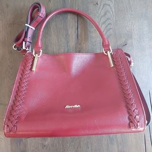 Zooler handbag with shoulder strap.